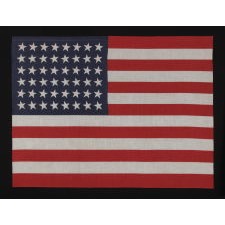 48 STARS IN DANCING ROWS, A RARE VARIETY OF ANTIQUE AMERICAN PARADE FLAG IN A LARGE SCALE, 1912-1918 OR PERHAPS EARLIER, ARIZONA & NEW MEXICO STATEHOOD