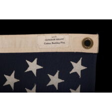 49 STAR AMERICAN FLAG IN A SMALL SCALE AMONG ITS COUNTERPARTS WITH PIECED AND SEWN CONSTRUCTION, REFLECTS THE ADDITION OF ALASKA IN 1959, OFFICIAL FOR JUST ONE YEAR; EXHIBITED JUNE-SEPTEMBER, 2021 AT THE MUSEUM OF THE AMERICAN REVOLUTION