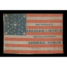 1860 ABRAHAM LINCOLN CAMPAIGN PARADE FLAG WITH 33 STARS IN AN EXTREMELY UNUSUAL VARIATION OF A MEDALLION CONFIGURATION, EXTREMELY RARE, ONE OF PERHAPS JUST TWO KNOWN EXAMPLES