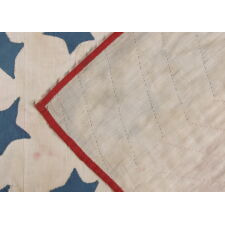 AMERICAN PATRIOTIC FLAG QUILT WITH 44 BLUE STARS SET UPON A WHITE GROUND IN THE TOP CENTER OF 13 RED, WHITE, AND BLUE STRIPES, 1890-1896, WYOMING STATEHOOD