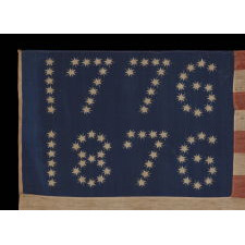 ANTIQUE AMERICAN FLAG WITH 10-POINTED STARS THAT SPELL “1776 – 1876”, MADE FOR THE 100-YEAR ANNIVERSARY OF AMERICAN INDEPENDENCE, ONE OF THE MOST GRAPHIC OF ALL EARLY EXAMPLES