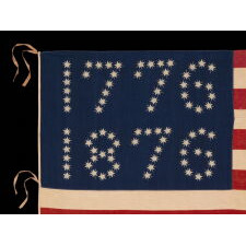 ANTIQUE AMERICAN FLAG WITH 10-POINTED STARS THAT SPELL “1776 – 1876”, MADE FOR THE 100-YEAR ANNIVERSARY OF AMERICAN INDEPENDENCE, ONE OF THE MOST GRAPHIC OF ALL EARLY EXAMPLES