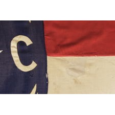 ANTIQUE STATE FLAG OF NORTH CAROLINA, MADE CIRCA 1900-WWI ERA (U.S. INVOLVEMENT 1917-18), MADE TO BE HAND-CARRIED ON A STAFF AND WITH BATTLE-FLAG-LIKE PROPORTIONS; IN SPITE OF ITS 1ST QUARTER 20TH CENTURY DATE, THIS IS THE EARLIEST EXAMPLE THAT I HAVE ENCOUNTERED IN PRIVATE HANDS: