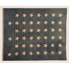 LARGE & BEAUTIFULLY FADED, ANTIQUE AMERICAN JACK w/ 45 STARS ARRANGED IN A “NOTCHED” PATTERN, INTENTIONALLY LEAVING SPACE FOR THE 3 REMAINING WESTERN TERRITORIES YET TO BE ADDED; MADE IN THE PERIOD BETWEEN 1896 - 1908, WHEN UTAH WAS THE MOST RECENT STATE TO JOIN THE UNION; SPANISH-AMERICAN WAR ERA