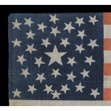 1860 CAMPAIGN PARADE FLAG WITH 33 STARS IN A PENTAGON MEDALLION AND AN INTRIGUING ABBREVIATION OF LINCOLN'S NAME, ATTRIBUTED TO H.C. HOWARD, PHILADELPHIA