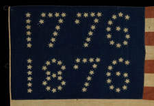 CENTENNIAL CELEBRATION FLAG WITH 10-POINTED STARS THAT SPELL "1776 - 1876", ONE OF THE MOST GRAPHIC OF ALL EARLY EXAMPLES