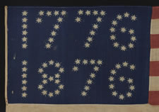 CENTENNIAL CELEBRATION FLAG WITH 10-POINTED STARS THAT SPELL "1776 - 1876", ONE OF THE MOST GRAPHIC OF ALL EARLY EXAMPLES