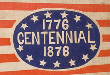 1876 CENTENNIAL PENNANT, BLUE OVAL OF WHIMSICAL TEXT ON RED & WHITE STRIPES