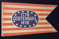 1876 CENTENNIAL PENNANT, BLUE OVAL OF WHIMSICAL TEXT ON RED & WHITE STRIPES