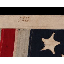 18 STAR ANTIQUE AMERICAN FLAG WITH 13 STRIPES, LIKELY MADE TO COMMEMORATE THE 1812 ADMISSION OF LOUISIANA AS THE 18TH STATE, AND PRODUCED EITHER FOR THE 1893 CHICAGO WORLD’S FAIR, OR THE 1876 PHILADELPHIA WORLD’S FAIR, ATTRIBUTED TO LEADING, CIVIL WAR, U.S. ARMY ENGINEER & CHICAGO ARCHITECT, WILLIAM LeBARON JENNEY