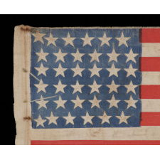 CIVIL WAR ERA PARADE FLAG WITH 36 STARS IN A SCARCE FORM THAT DISPLAYS A “U” FOR UNION