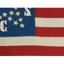 CIVIL WAR PRESENTATION BATTLE FLAG OF THE 64TH NEW YORK VOLUNTEERS, COMPANY “C”, DESCENDED THROUGH THE FAMILY OF ITS COLOR SEARGEANT, NICHOLAS WHITMIRE, ONE OF THE BEST OF ALL EXAMPLES THAT EXISTS IN PRIVATE HANDS