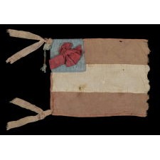 CONFEDERATE 1ST NATIONAL PATTERN BIBLE FLAG WITH A RIBBON IN PLACE OF STARS, ATTRIBUTED TO DANIEL CLANCY OF THE 2ND KENTUCKY INFANTRY, WHO SPENT TIME IN THE UNION MILITARY PRISON AT FORT DONELSON, TENNESSEE AND POSSIBLY AT CINCINNATI, OHIO, AND WAS SUBSEQUENTLY KILLED AT VICKSBURG