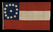 CONFEDERATE 1ST NATIONAL (STARS & BARS) PATTERN FLAG, POSSIBLY A NAVAL ENSIGN, WITH 13 LARGE STARS IN A WHIMSICAL WREATH, ENTIRELY HAND-SEWN, 1861-63