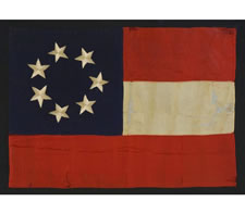 CONFEDERATE OFFICER'S FLAG OR GUIDON IN THE 1ST NATIONAL (STARS & BARS)  PATTERN, HAND-SEWN SILK WITH 7 HAND-EMBROIDERED STARS IN A WREATH PATTERN, SAID TO HAVE BEEN MADE BY "LADIES IN RALEIGH" FOR THE 1ST NORTH CAROLINA INFANTRY