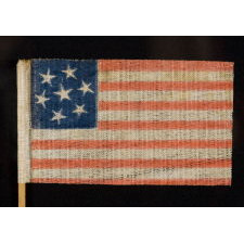 CONFEDERATE SYMPATHIZER PARADE FLAG WITH 7 GRAPHICALLY WHIMSICAL STARS THAT REFLECT THE INITIAL WAVE OF 7 STATES SECEDED FROM THE UNION, A WAR-PERIOD EXAMPLE, 1861