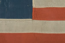 ENTIRELY HAND-SEWN 13 STAR FLAG MADE BY THE GRANDDAUGHTER OR GREAT-GRANDDAUGHTER OF BETSY ROSS, RACHEL ABRIGHT OR SARAH M. WILSON, IN PHILADELPHIA IN 1905, THE LARGEST EXAMPLE PRESENTLY KNOWN TO EXIST