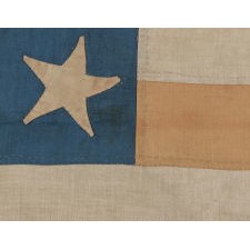 ENTIRELY HAND-SEWN AMERICAN NATIONAL FLAG WITH 13 STARS ON A TALL AND NARROW CANTON; A HOMEMADE EXAMPLE WITH INTERESTING PRESENTATION, MADE SOMETIME BETWEEN THE TAIL END OF THE CIVIL WAR AND THE 1876 CENTENNIAL