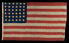 ENTIRELY HAND-SEWN FLAG WITH 36 STARS, CIVIL WAR ERA, MADE BY ANNIN IN NEW YORK CITY, IN AN UNUSUAL AND DESIRABLE SMALL SIZE FOR THE PERIOD, NEVADA STATEHOOD, 1864-67