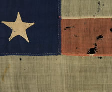 ENTIRELY HAND-SEWN FLAG OF THE CIVIL WAR PERIOD, WITH 35 STARS, 1863-65, WEST VIRGINIA STATEHOOD, IN A SMALL SCALE FOR THE PERIOD AND HIGHLY UNUSUAL WITH DIFFERENT SIZES OF STARS ON ITS OPPOSING SIDES