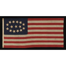 ESPECIALLY RARE 15-STAR FLAG WITH AN EQUALLY RARE AND BEAUTIFUL ELLIPTICAL CONFIGURATION, MADE SOMETIME DURING THE MID-LATE 19TH CENTURY, PERHAPS TO GLORIFY KENTUCKY AS THE 15TH STATE