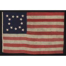 AN EXCEPTIONAL, PRE-CIVIL WAR, 13 STAR FLAG WITH A BEAUTIFUL MEDALLION CONFIGURATION OF STARS THAT IS UNIQUE AMONG ITS KNOWN EARLY COUNTERPARTS, 1830-1850