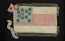 EXTRAORDINARY CONFEDERATE BIBLE FLAG OF CAPTAIN WILLIAM M. HARRIS OF VICKSBURG, MISSISSIPPI, WHO SERVED ON THE STAFF OF HIS BROTHER, GENERAL NATHANIEL H. HARRIS, IN HARRIS'S BRIGADE, WITH A LARGE SCRAPBOOK OF ASSOCIATED DOCUMENTS AND PHOTOS