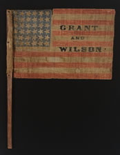 EXTREMELY RARE, 36 STAR, OVERPRINTED PARADE FLAG, MADE FOR THE 1872 PRESIDENTIAL CAMPAIGN OF ULYSSES S. GRANT & HENRY WILSON, ON ITS ORIGINAL, CARVED WOODEN STAFF