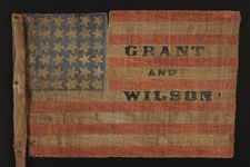 EXTREMELY RARE, 36 STAR, OVERPRINTED PARADE FLAG, MADE FOR THE 1872 PRESIDENTIAL CAMPAIGN OF ULYSSES S. GRANT & HENRY WILSON, ON ITS ORIGINAL, CARVED WOODEN STAFF