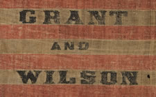 EXTREMELY RARE, 36 STAR, OVERPRINTED PARADE FLAG, MADE FOR THE 1872 PRESIDENTIAL CAMPAIGN OF ULYSSES S. GRANT & HENRY WILSON, ON ITS ORIGINAL, CARVED WOODEN STAFF