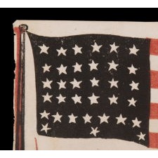 EXTREMELY RARE ABRAHAM LINCOLN MOURNING FLAG, WITH HIS PORTRAIT IN THE STRIPED FIELD; PRINTED ON PAPER, SIGNED “LYBRAND,” 1865