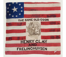 EXTREMELY RARE SILK PARADE FLAG, MADE FOR THE 1844 PRESIDENTIAL CAMPAIGN OF HENRY CLAY, WITH THE WHIG PARTY'S RACCOON MASCOT AND A CLEVER SLOGAN, THE PLATE EXAMPLE FROM THE BOOK "THREADS OF HISTORY"