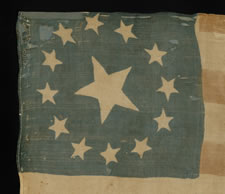 THE FIRST YEAR FOR POLITICAL CAMPAIGN PARADE FLAGS:A RARE EXAMPLE FROM THE 1840 PRESIDENTIAL CAMPAIGN OF WILLIAM HENRY HARRISON, WITH 13 STARS IN A 3rd MARYLAND PATTERN AND A FOLK PORTRAIT OF "OLD TIPPECANOE" IN MILITARY GARB