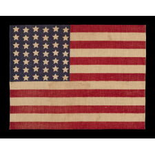 42 STARS ON AN ANTIQUE AMERICAN FLAG WITH A WAVE CONFIGURATION OF LINEAL COLUMNS, AN UNOFFICIAL STAR COUNT THAT REFLECTS THE ADDITION OF WASHINGTON STATE, MONTANA, AND THE DAKOTAS, circa 1889-1890