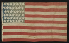 FROM THE MASTAI COLLECTION OF ANTIQUE AMERICAN FLAGS, FEATURED ON THE INSIDE PAPERS OF THE MASTAI BOOK:  42 STARS, A HOMEMADE COTTON FLAG WITH GREAT FOLK QUALITIES, WASHINGTON STATEHOOD, 1889-1890