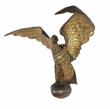 LARGE AND IMPRESSIVE PRESSED BRASS EAGLE, AN EARLY PARADE FLAG HOLDER & BUNTING TIE-BACK, MADE IN NEW YORK, PATENTED 1891