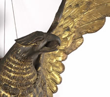 LARGE AND IMPRESSIVE PRESSED BRASS EAGLE, AN EARLY PARADE FLAG HOLDER & BUNTING TIE-BACK, MADE IN NEW YORK, PATENTED 1891