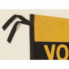 LARGE, SWALLOWTAILED, YELLOW SUFFRAGETTE PENNANT WITH APPLIED LETTERING THAT READS "VOTES FOR WOMEN” DOWN A WIDE BLACK STRIPE, CIRCA 1910-1920