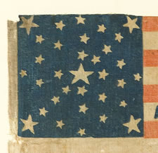 LINCOLN & HAMLIN CAMPAIGN PARADE FLAG, 1860 ELECTION, 33 STARS IN A RARE VARIATION ON A KNOWN TYPE OF STARBURST MEDALLION, THE ONLY KNOWN EXAMPLE IN THIS STYLE