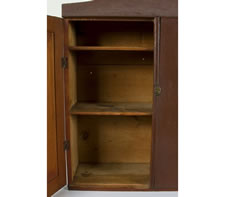 MAINE HANGING CUPBOARD WITH OXBLOOD RED PAINT AND EXCEPTIONAL SURFACE, CA 1830-50