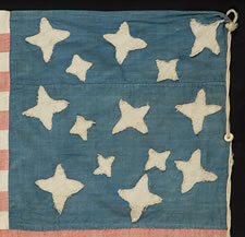 A MASTERPIECE OF FOLK ART IN EARLY FLAG-MAKING:  14 STARS AND 21 STRIPES, WHALEBONE EYELETS, A HIGHLY UNUSUAL FLAG WITH POSSIBLE VERMONT & CIVIL WAR ASSOCIATIONS