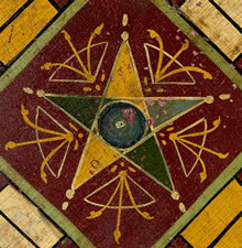 MASTERPIECE QUALITY AMERICAN PARCHEESI BOARD WITH CARRIAGE-PAINTED CENTER STAR, DIMINUTIVE SIZE, AND A BOLD COMBINATION OF SEVEN COLORS, CA 1870