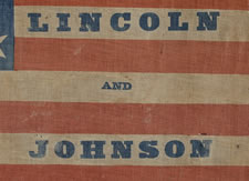 ONE OF THE LARGEST KNOWN PARADE FLAGS MADE FOR THE 1864 CAMPAIGN OF ABRAHAM LINCOLN & ANDREW JOHNSON, 34 STARS IN A MEDALLION CONFIGURATION ON A CHROME BLUE CANTON WITH MATCHING BLUE TEXT, AN EXTRAORDINARY EXAMPLE