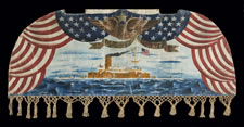 PATRIOTIC BANNER DEPICTING THE U.S.S. MONTEREY, FRAMED BY BILLOWING FLAGS, A SPREADWING EAGLE, AND SALIOR-BRAIDED ROPE FRINGE, ca 1898-99