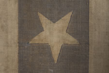 PATRIOTIC 1876 CENTENNIAL BANNER WITH AN EAGLE CARRYING THE LIBERTY BELL, SURROUNDED BY 13 STARS AND FLANKED BY PATRIOTIC PHRASES, WITH 38 STARS AROUND THE PERIMETER: