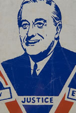 PATRIOTIC WINDOW BANNER WITH A PORTRAIT OF FRANKLIN DELANO ROOSEVELT SET INSIDE A "V-FOR-VICTORY", FLANKED BY GEORGE WASHINGTON AND ABRAHAM LINCOLN, MADE TO SUPPORT HIS RE-ELECTION IN 1944, A SCARCE CAMPAIGN TEXTILE FROM WWII