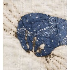 PRE-CIVIL WAR AMERICAN CRIB QUILT WITH A FEDERAL EAGLE, 16 EIGHT-POINTED STARS, AND 16 STRIPES UPON ITS BREAST, BLUE CALICO ON WHITE, CIRCA 1830-1850