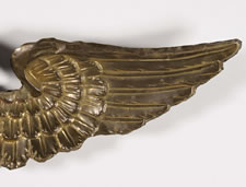 PRESSED BRASS EAGLE, AN EARLY PARADE FLAG HOLDER & BUNTING TIE-BACK, AN ESPECIALLY ATTRACTIVE EXAMPLE, ca 1890