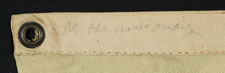 PRIVATE OWNER'S YACHT BURGEE, ENTIRELY HAND-SEWN, WITH 13 RED STARS ARRANGED IN A WREATH, SURROUNDING A SINGLE, LARGE, NAVY BLUE CENTER STAR, ALL ON A WHITE GROUND, CA 1860-1880, SIGNED ON THE HOIST "M. HEMINGWAY"