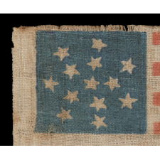 RARE 13 STAR PARADE FLAG DATING TO THE CIVIL WAR PERIOD (1861-65) OR PRIOR, WITH AN EXCEPTIONALLY RARE AND BEAUTIFUL SNOWFLAKE MEDALLION CONFIGURATION OF 13 STARS